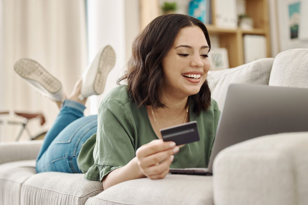 Person enjoying rewards on a laptop